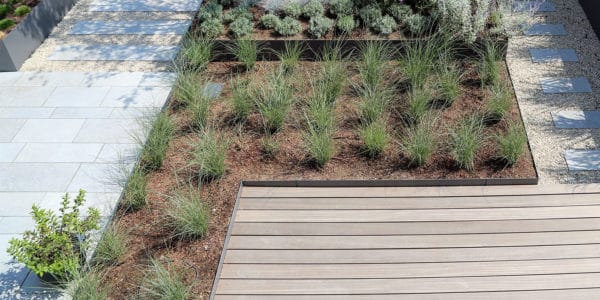 Sol pierre naturelle et terrasse bois