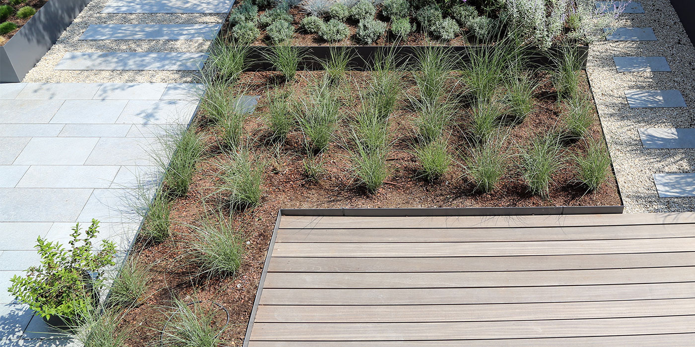 Sol pierre naturelle et terrasse bois